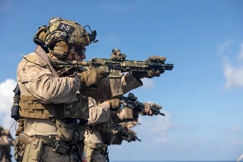 marine firing M27, reject m7 citing size and weight