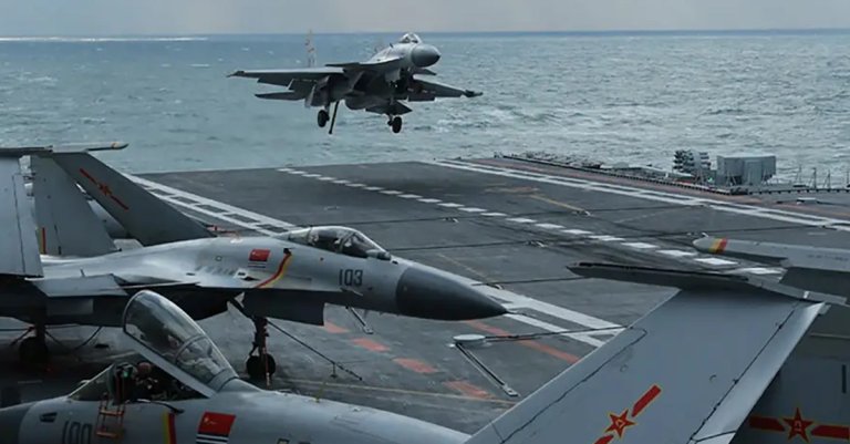 Chinese J-15 fighter jets on the deck of the aircraft carrier Liaoning.