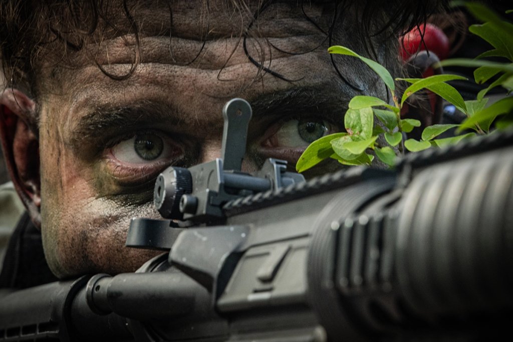 U.S. Army Staff Sgt. Eric Higgins, an infantryman with the Pennsylvania Army National Guard, takes aim with an M16 rifle during an ambush situational training exercise at Joint Base McGuire-Dix-Lakehurst, New Jersey, July 26, 2025. The 254th Regiment’s Regional Training Institute hosts the U.S. Army’s Infantry Advanced Leaders Course, which brings together Soldiers from all three U.S. Army components to train the next generation of warfighting leaders in the Infantry branch. (U.S. Army National Guard photo by Sgt. Seth Cohen)