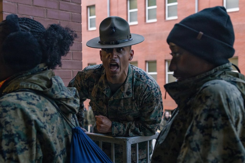 Educators enter a recruit squad bay during the Educators’ Workshop aboard Marine Corps Recruit Depot Parris Island.