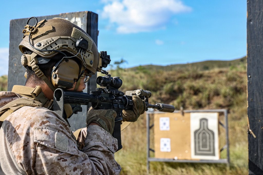 A U.S. Marine with Kilo Company, Battalion Landing Team 3/6, 22nd Marine Expeditionary Unit (Special Operations Capable), fires an M4 carbine near perfect during a short bay range on Camp Santiago, Puerto Rico, Dec. 8, 2025. U.S. military forces are deployed to the Caribbean in support of the U.S. Southern Command mission, Department of War-directed operations, and the president’s priorities to disrupt illicit drug trafficking and protect the homeland. (U.S. Marine Corps photo)