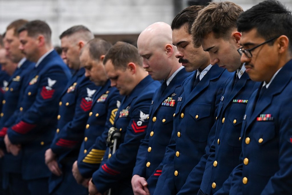 Friends and family of Petty Officer 2nd Class Tyler Jaggers honor his memory during a memorial service at Coast Guard Air Station Astoria.