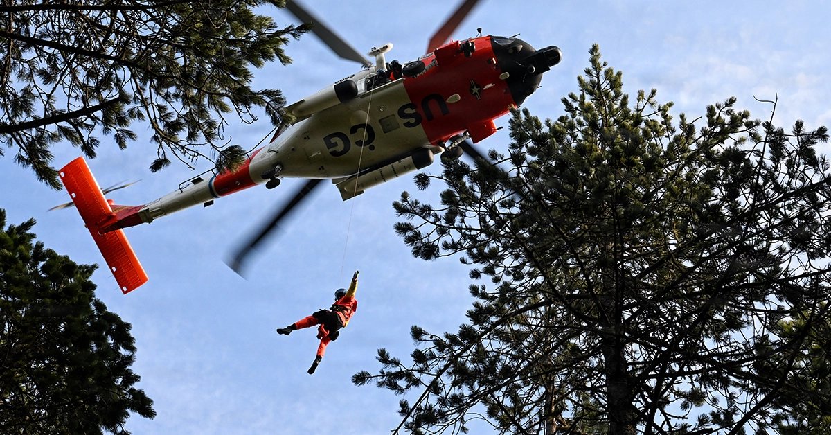U.S. Coast Guard MH-60 Jayhawk helicopter aircrew train as part of the Advanced Helicopter Rescue School (AHRS)