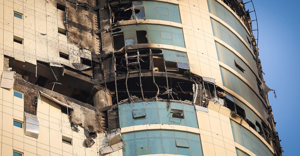 A view of damage after a kamikaze drone struck several buildings during Iran's retaliatory attack following US and Israeli strikes in Manama, Bahrain on March 1, 2026. (Anadolu via Getty Images)
