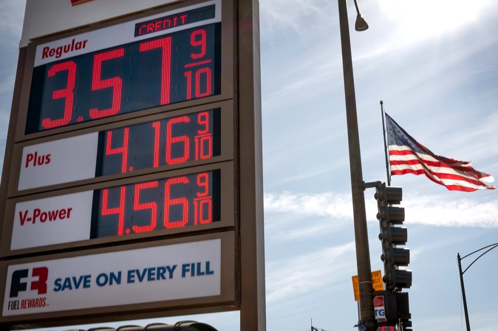 A sign displays prices for gasoline at a station on March 02, 2026 in Chicago, Illinois.