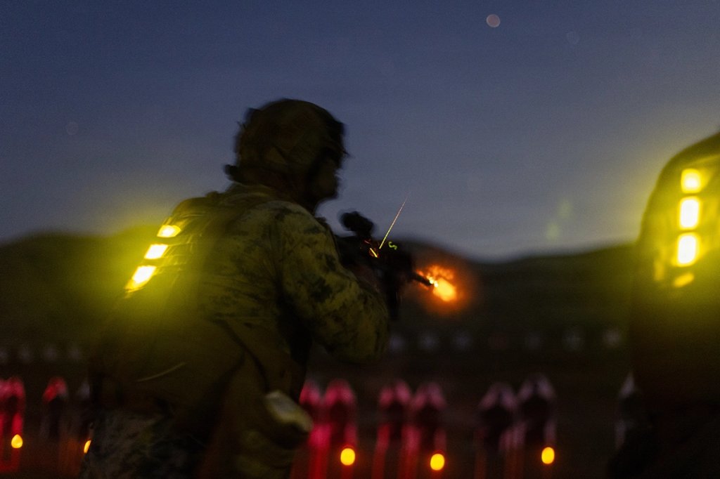 U.S. Marine Corps Staff Sgt. Jadrian Brazle, a supply administration chief with Combat Logistics Regiment 17, 1st Marine Logistics Group, fires an M4 carbine near perfect service rifle during Annual Rifle Qualification Tables 3-6 range at Marine Corps Base Camp Pendleton, California, March 11, 2026. The range reinforces fundamental marksmanship skills and ensures Marines maintain the accuracy, confidence, and combat readiness required to effectively engage targets in operational environments. (U.S. Marine Corps photo by Lance Cpl. Mhecaela Watts)