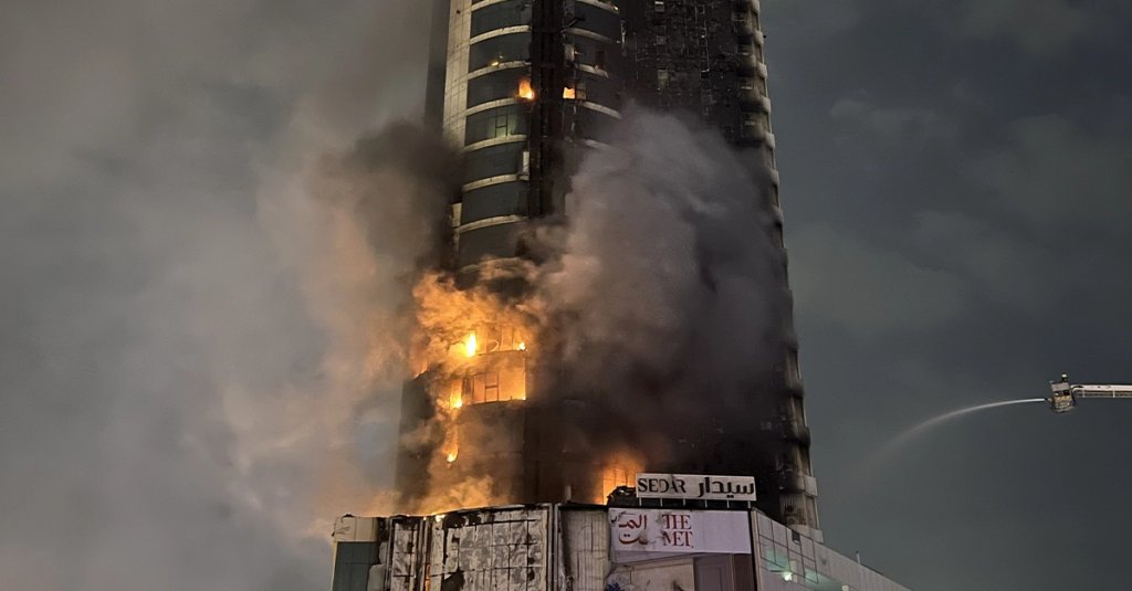 A view of fire that broke out in a building targeted by Iranian unmanned aerial vehicles as Iran attacked several buildings in Manama, the capital of Bahrain, on February 28, 2026. (Photo by Stringer/Anadolu via Getty Images)