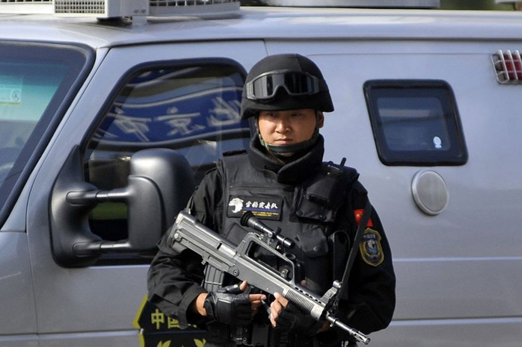 BEIJING, CHINA - 2009/09/24: Snow Leopard Commando patrolling at Xuanwumen, one of the busiest districts in Beijing. Snow Leopard Commando is the first and highest-ranked national anti-terrorist unit founded in 2002. With the National Day approaching, Beijing has reinforced and strengthened security forces. (Photo by Zhang Peng/LightRocket via Getty Images)