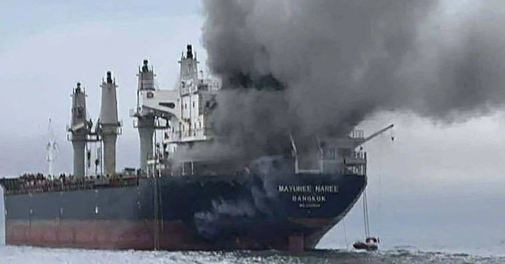 smoke rising from the Thai bulk carrier 'Mayuree Naree' near the Strait of Hormuz after an attack. A Thai bulk carrier travelling in the crucial Strait of Hormuz was attacked March 11, with 20 crew members rescued so far