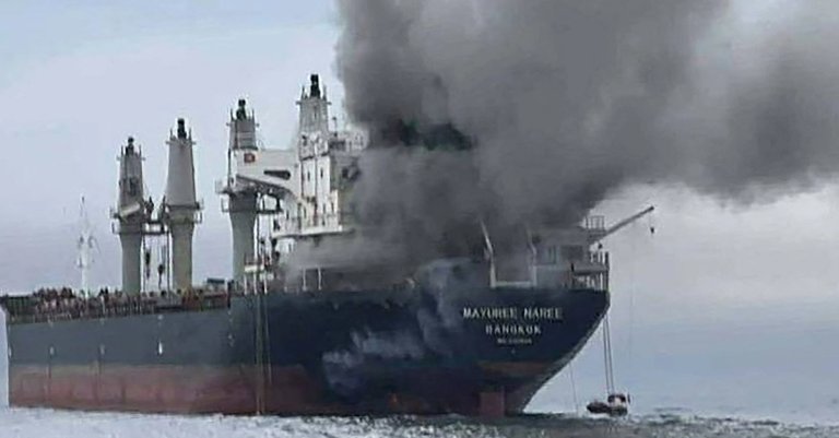 smoke rising from the Thai bulk carrier 'Mayuree Naree' near the Strait of Hormuz after an attack. A Thai bulk carrier travelling in the crucial Strait of Hormuz was attacked March 11, with 20 crew members rescued so far