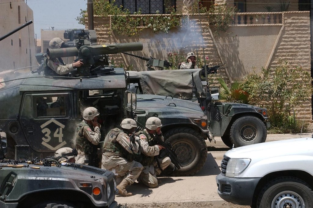 Soldiers of the Army's 101st Airborne Division (Air Assault) fire a TOW missile at a building suspected of harboring Saddam Hussein's sons Uday and Qusay in Mosul, Iraq.(U.S. Army/Sgt. Curtis G. Hargrave)