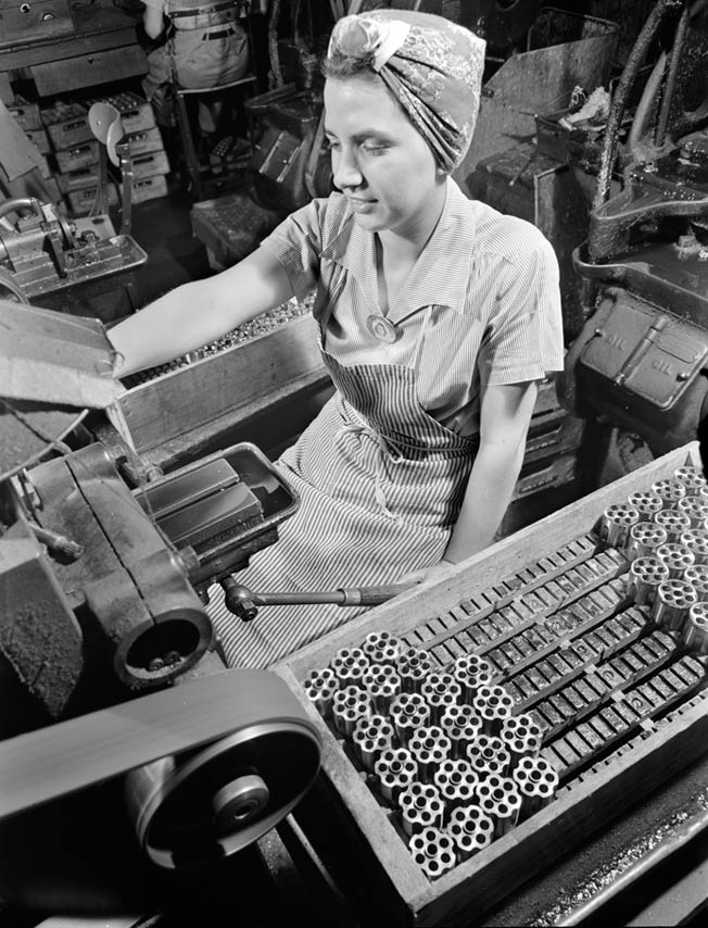 woman making Colt Detective Special in manufacturing plant