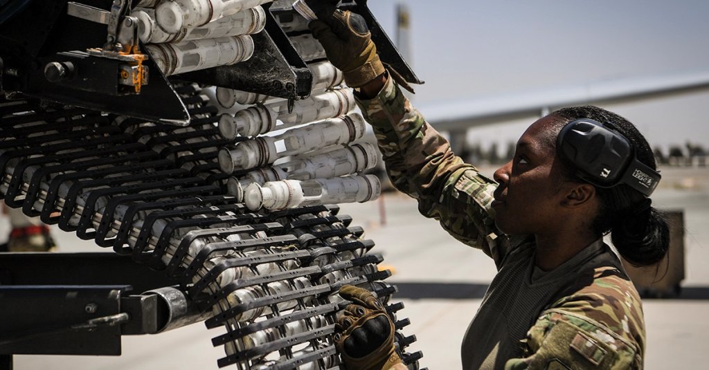 U.S. Air Force Staff Sgt. Sharane Watson reloads the General Electric GAU/8 Avenger 30mm hydraulically driven seven-barrel autocannon of an A-10 Thunderbolt II at Kandahar Airfield, Afghanistan May 20, 2018.