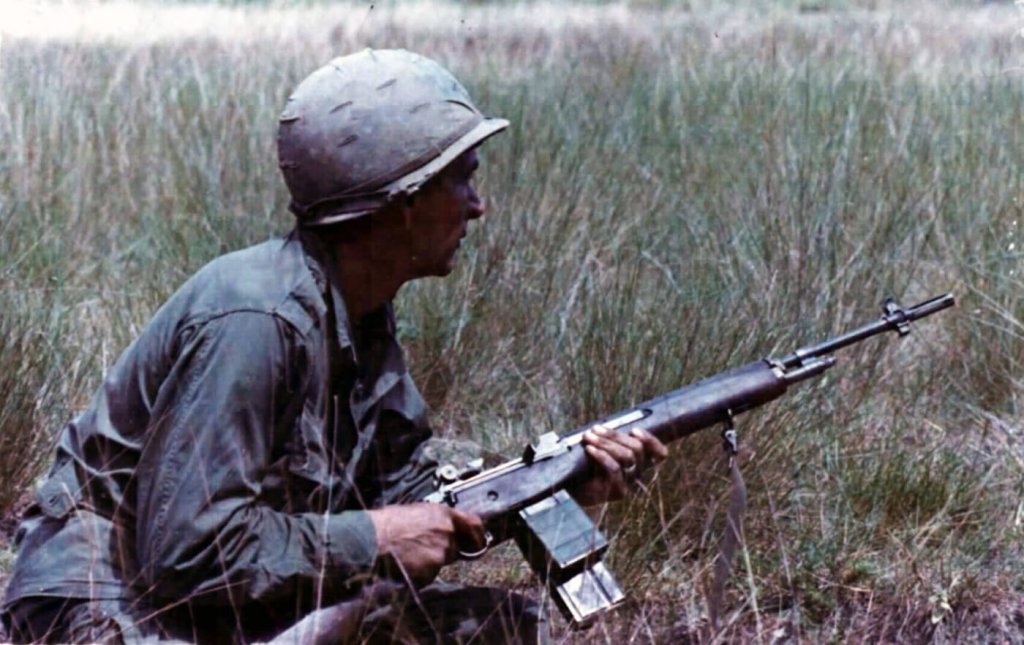 A rifleman of the 1st Infantry Division armed with a 7.62mm round M14 near Bien Hoa, October 1965. (National Archives)