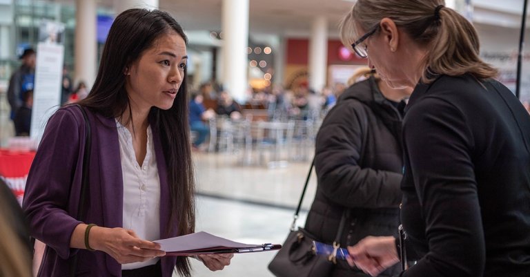 A military spouse looks over current positions available under the Direct Hiring Authority for military spouse employment