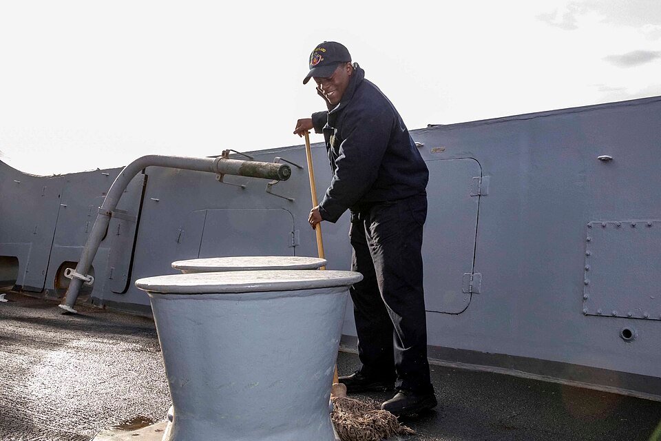 170410-N-FM530-048 MEDITERRANEAN SEA (April 10, 2017) Boatswain's Mate Seaman Deshawn Johnson swabs the deck aboard the amphibious transport dock ship USS Mesa Verde (LPD 19), April 10, 2017. The ship is deployed with the Bataan Amphibious Ready Group to support maritime security operations and theater security cooperation efforts in the U.S. 6th Fleet area of operations. (U.S. Navy photo by Mass Communication Specialist 2nd Class Brent Pyfrom/Released)