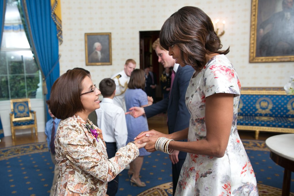 First Lady Michelle Obama, Dr. Jill Biden and Prince Harry of Wales, participate in a receiving line in the Blue Room during the Joining Forces initiative Mother's Day tea in honor of military mothers at the White House, May 9, 2013. (Official White House Photo by Lawrence Jackson)