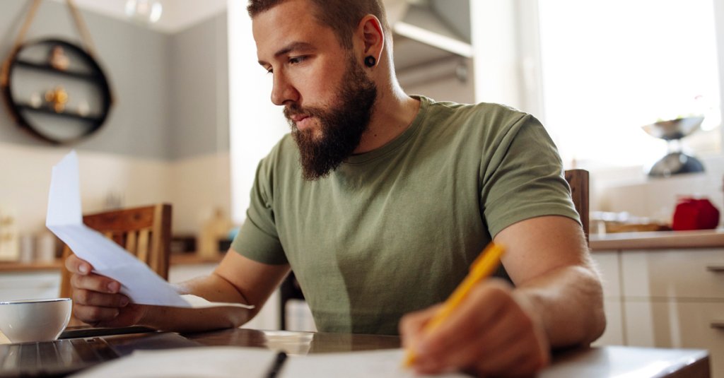 Focused Man Reviewing Finances