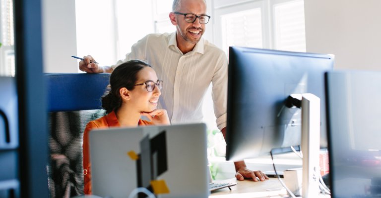 Computer programmers working together
