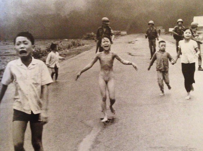 1973 - Vietnamese children fleeing after napalm attack on Vietcong-held village