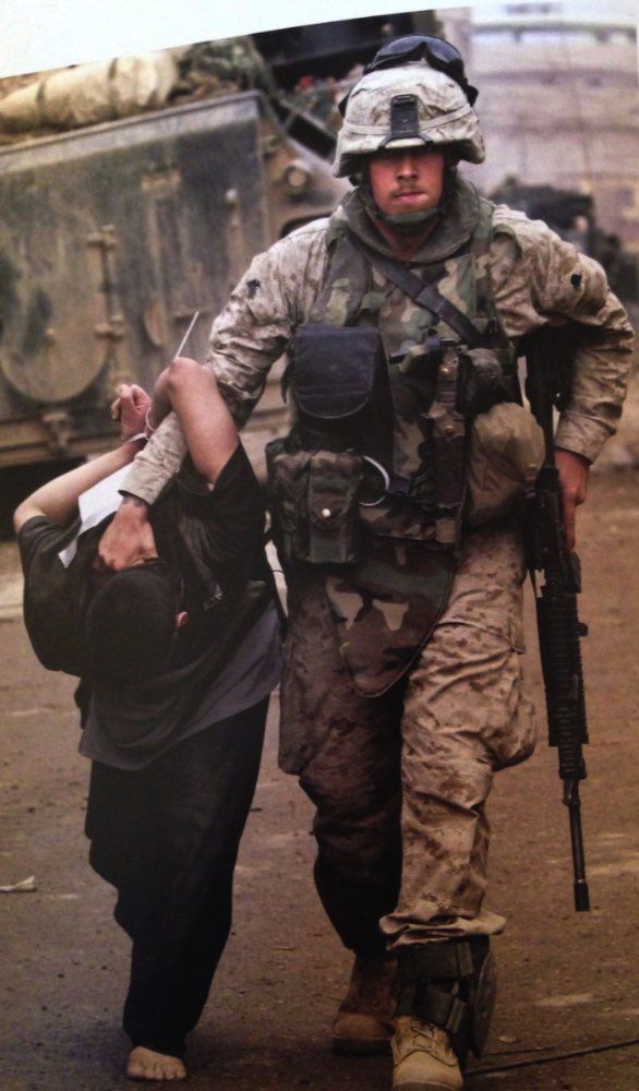 2005 - Marine taking an Iraqi insurgent prisoner in Fallujah pulitzer prize