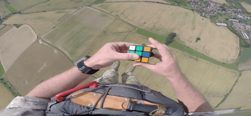 Here’s a video of a soldier jumping out of an airplane and solving a Rubik’s Cube