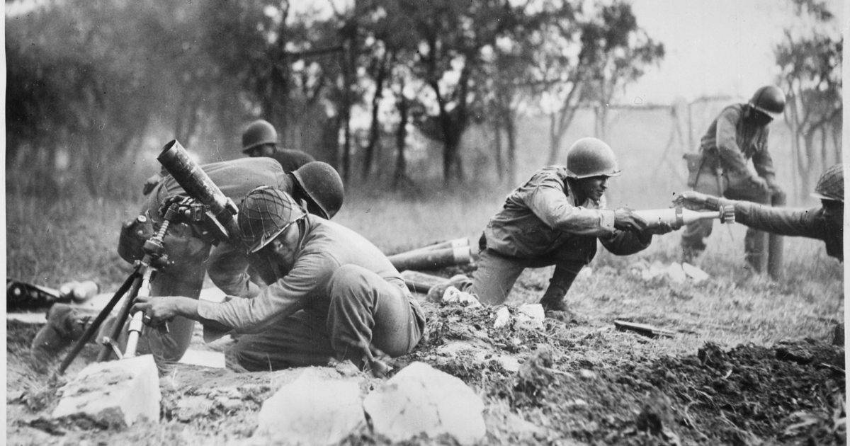 Why American paratroopers in World War II wore yellow gloves