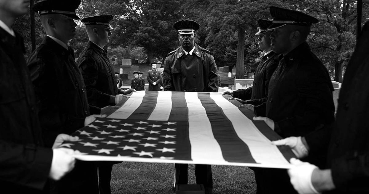 Old Guard soldiers place the flags at Arlington National Cemetery – Memorial Day 2022