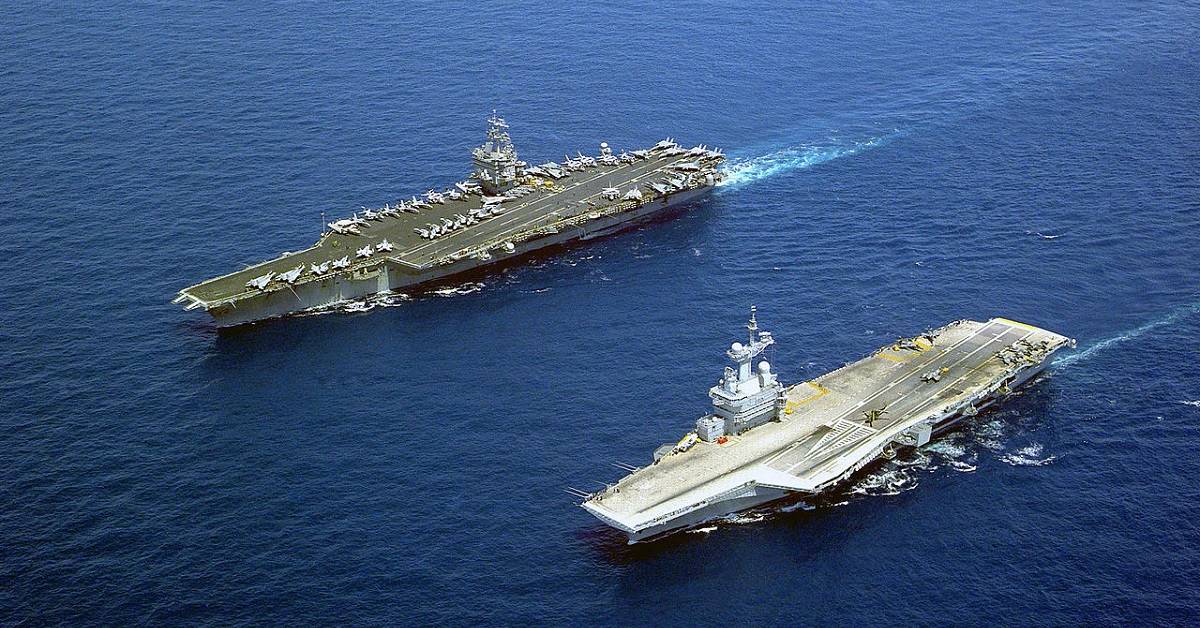 Watch this bomber’s rare low-level flyover of powerful Navy carriers