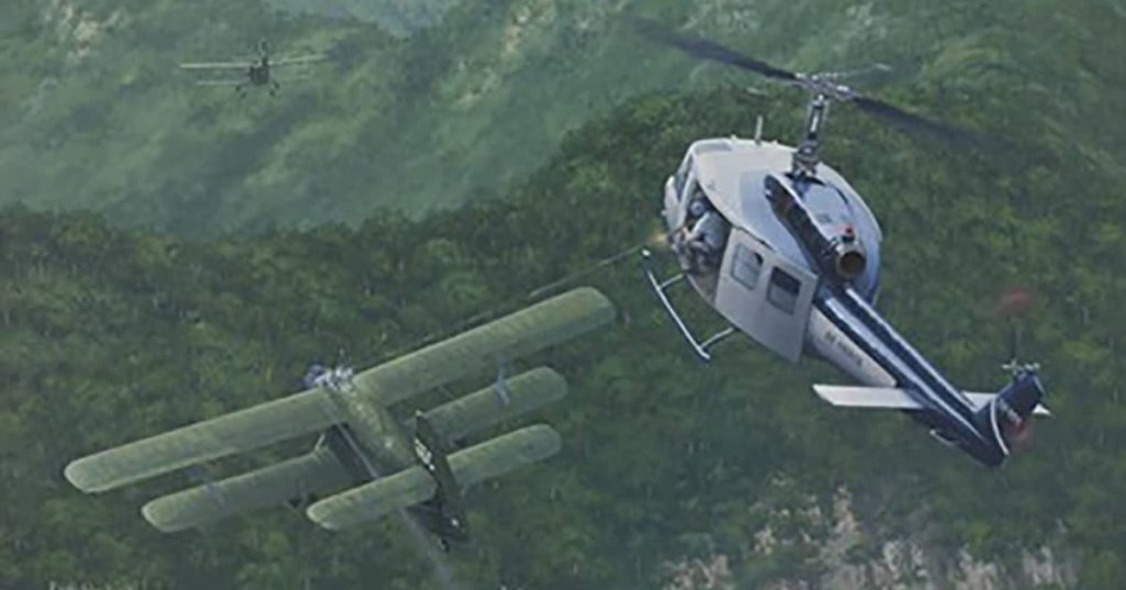 Painting of an Air America Bell 205 helicopter engaging two Vietnam People's Air Force Antonov An-2 biplanes dropping 120 mm mortar rounds on Lima Site 85, Laos,12 January 1968