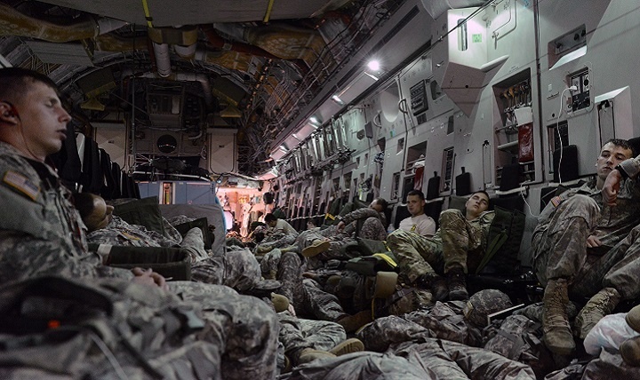 troops sleep on plane