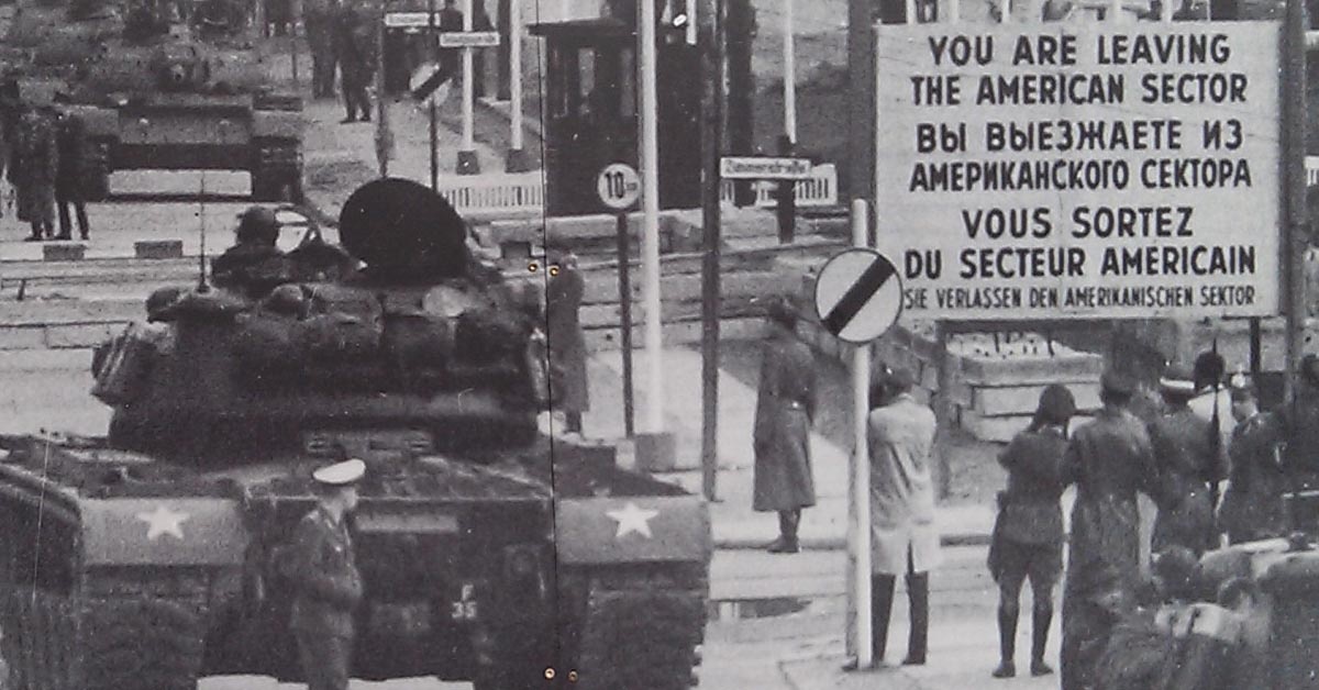 This real soldier’s photo is still hanging at Checkpoint Charlie