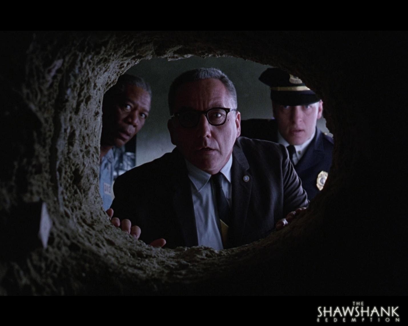 Bob Gunton in a Shawshank Redemption poster with Morgan Freeman and Clancy Brown